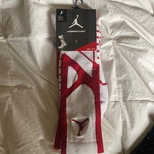 Jordan red and white socks 8-12 (size) $10 each pair